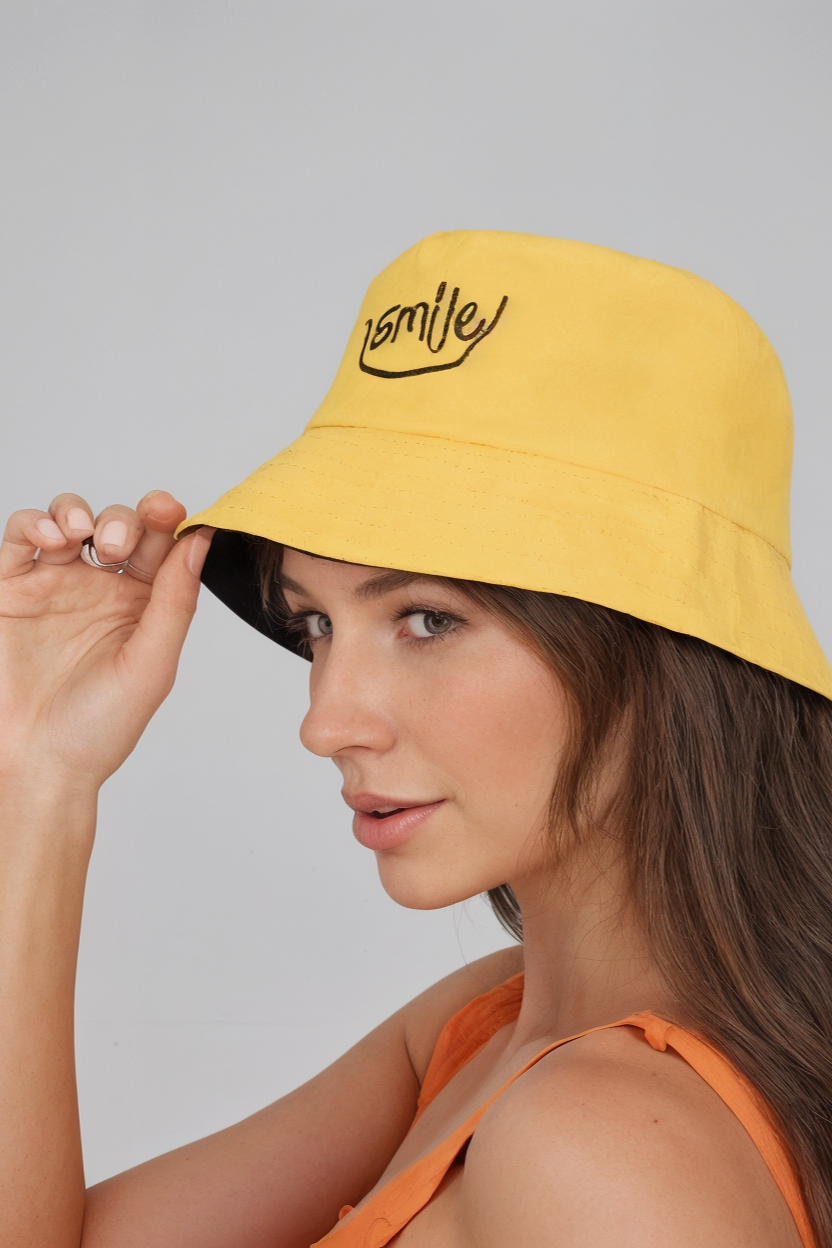 Reversible Smiley Face Bucket Hat | Black and Yellow Cotton Sun Hat | Packable Beach & Festival Hat for Men, Women & Teens