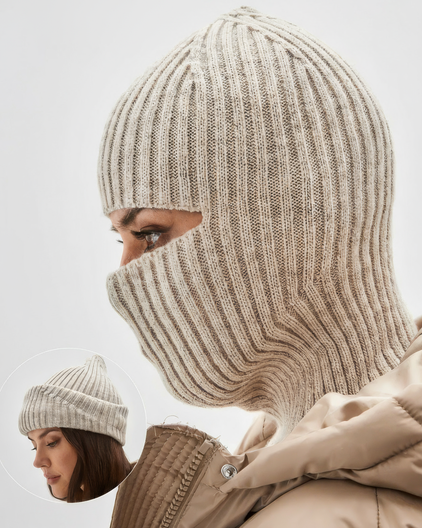 Two people wearing beige knitted hats and coats against a light background