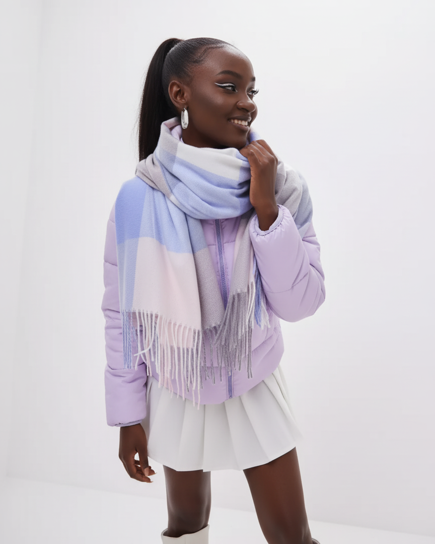 Woman wearing a colorful scarf with a white background
